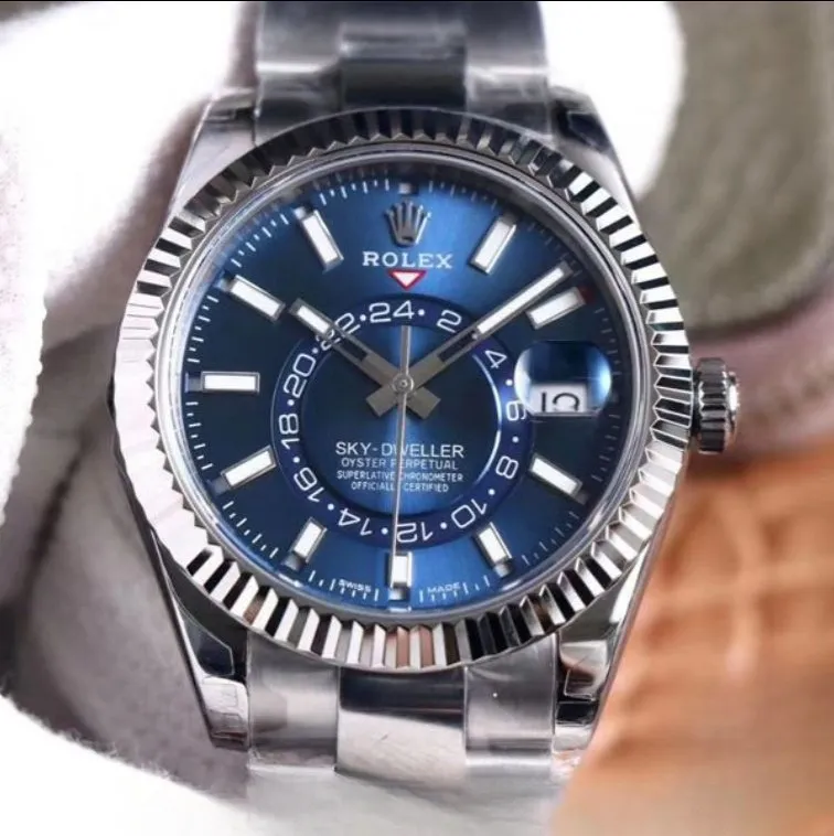 Rolex Sky Dweller Blue Dial White Gold Bezel Steel Oyster 326934 NP